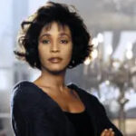 Whitney Houston as Rachel Marron in The Bodyguard, singing I Will Always Love You