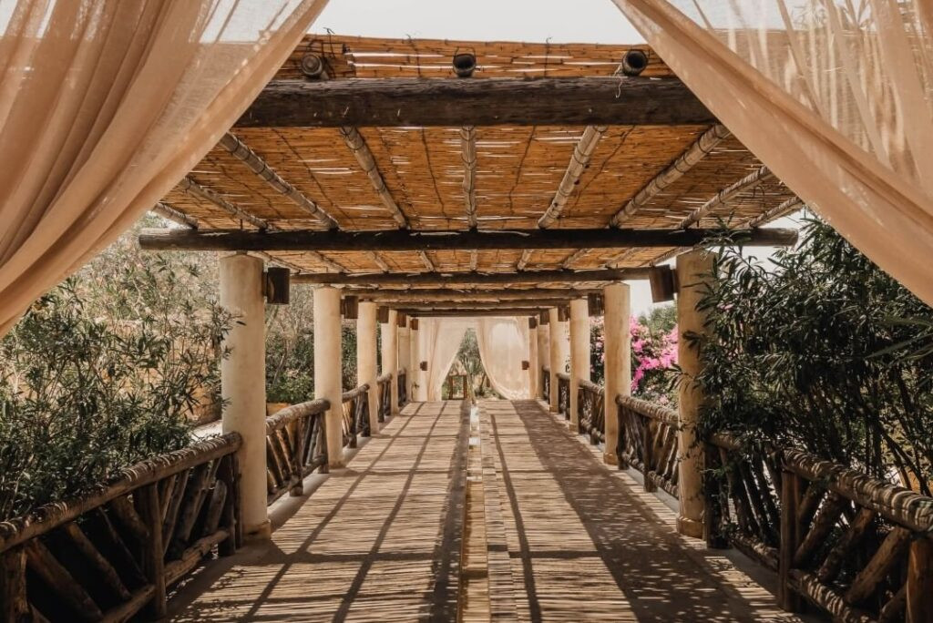 alt text: A picturesque view of the EddeSands Hotel & Wellness Resort in Byblos, Lebanon, showing its luxurious pools and beach access.