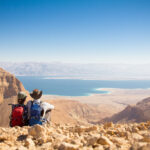 Couple in love overlooking the Dead Sea. Ahava is one of the Hebrew words for love