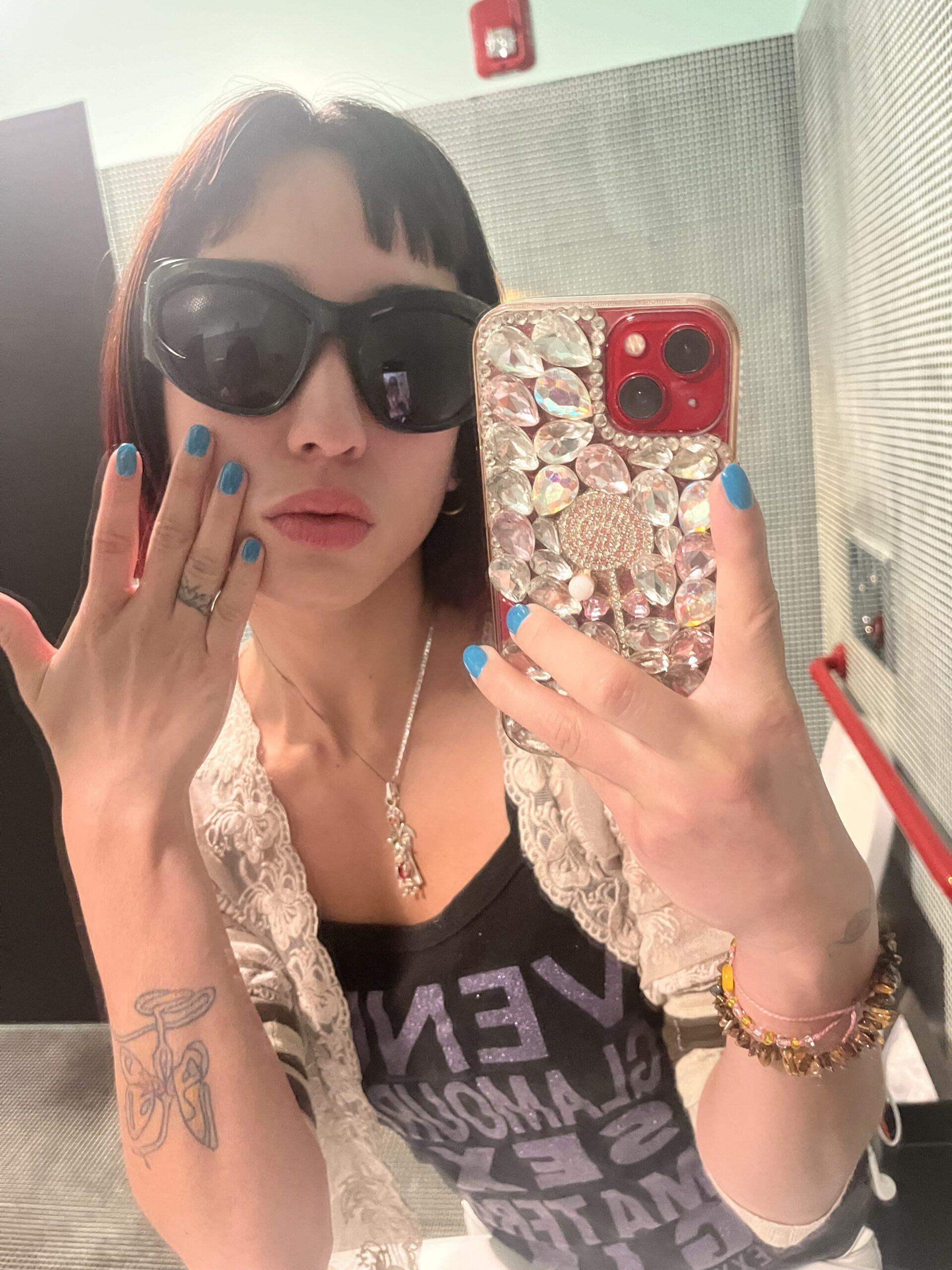 Isabella Lovestory showcasing her &quot;Boats &amp; Bikinis&quot; nail polish in Miami