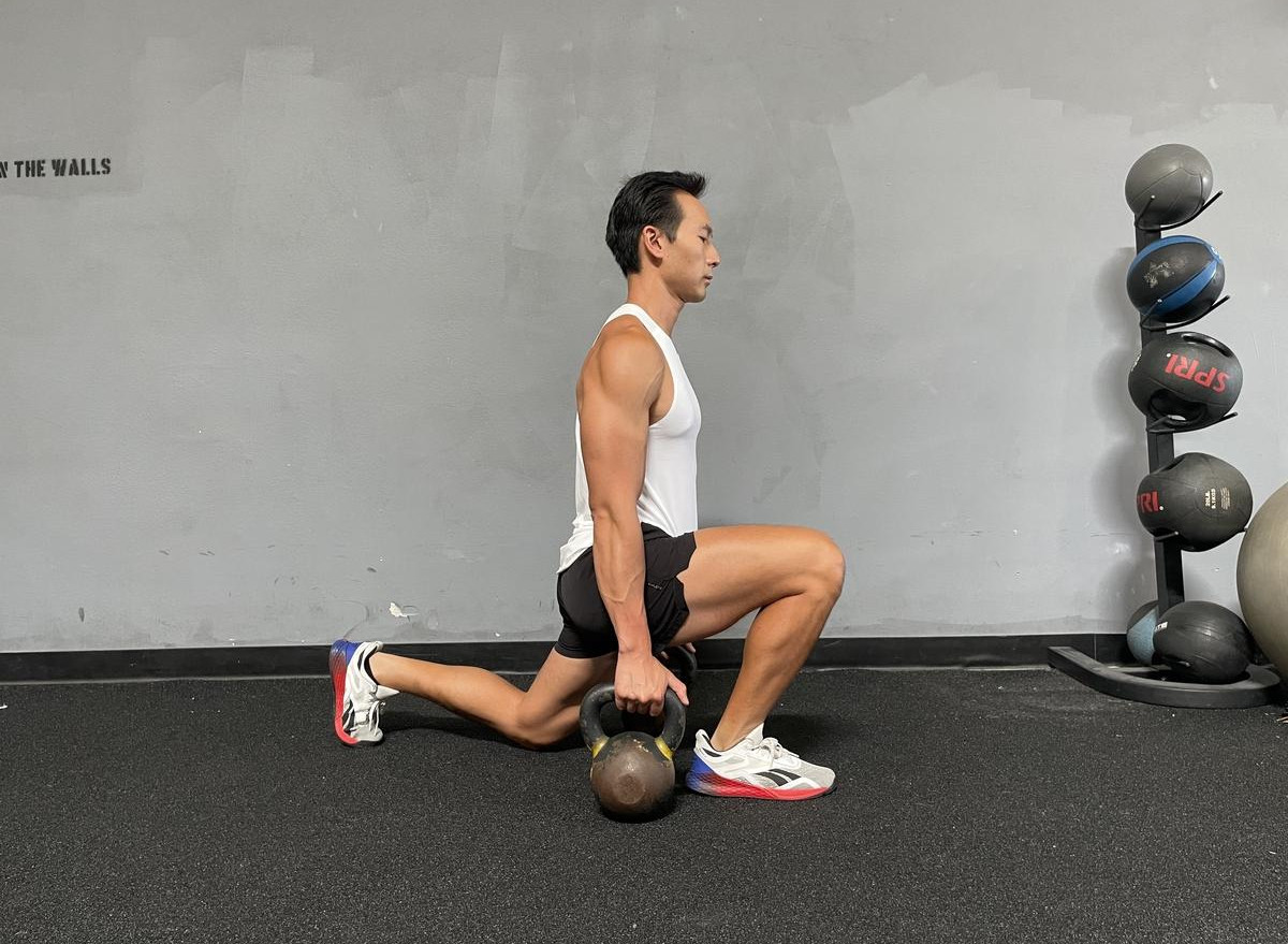 Kettlebell Walking Lunges exercise for leg and core strength to lose love handles quickly