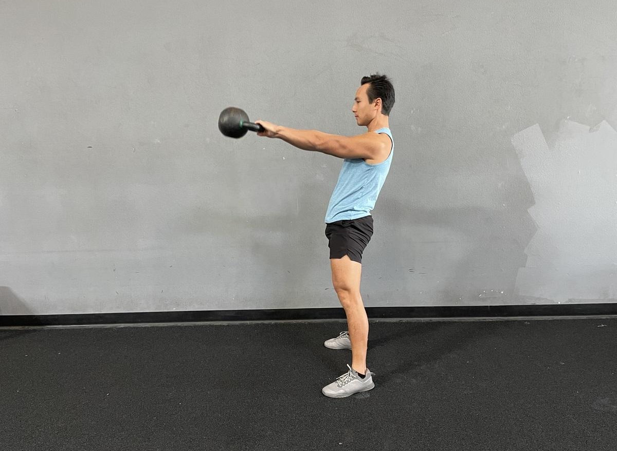 Kettlebell Swing exercise for full body conditioning and fat burning to lose muffin top