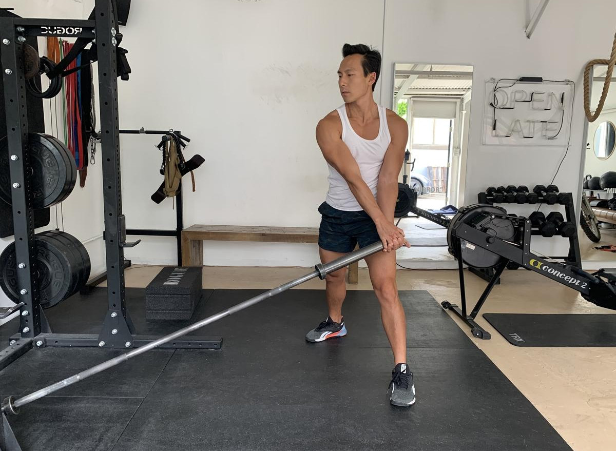 Landmine Rotation exercise for core strength and oblique engagement to reduce love handles