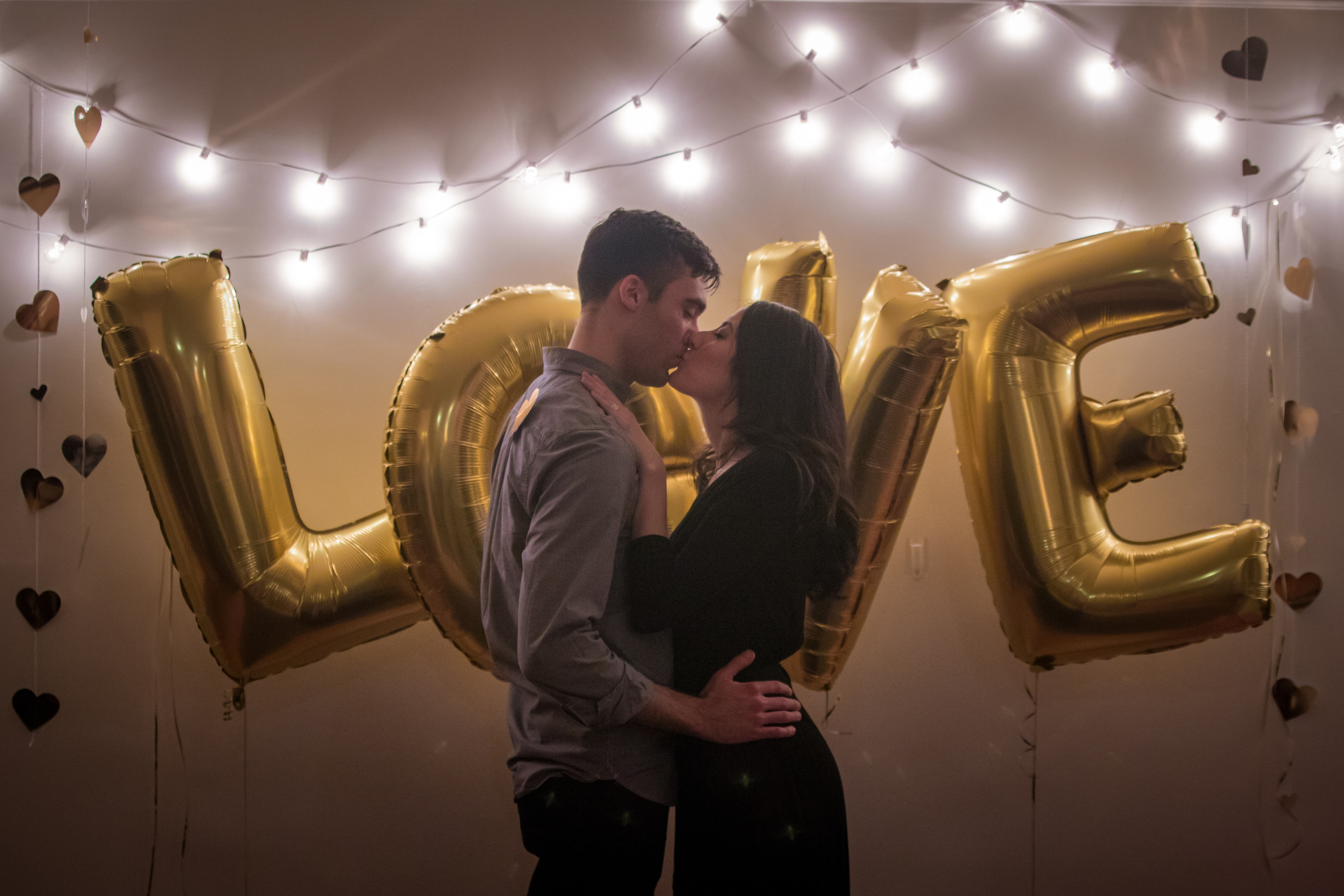 alt text: A young couple holding hands, symbolizing the early stages of love and connection.