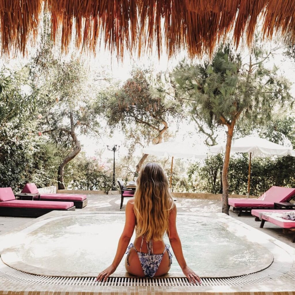 alt text showing people enjoying the pool and amenities at Edde Sands